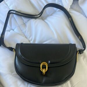 Black crescent saddle purse